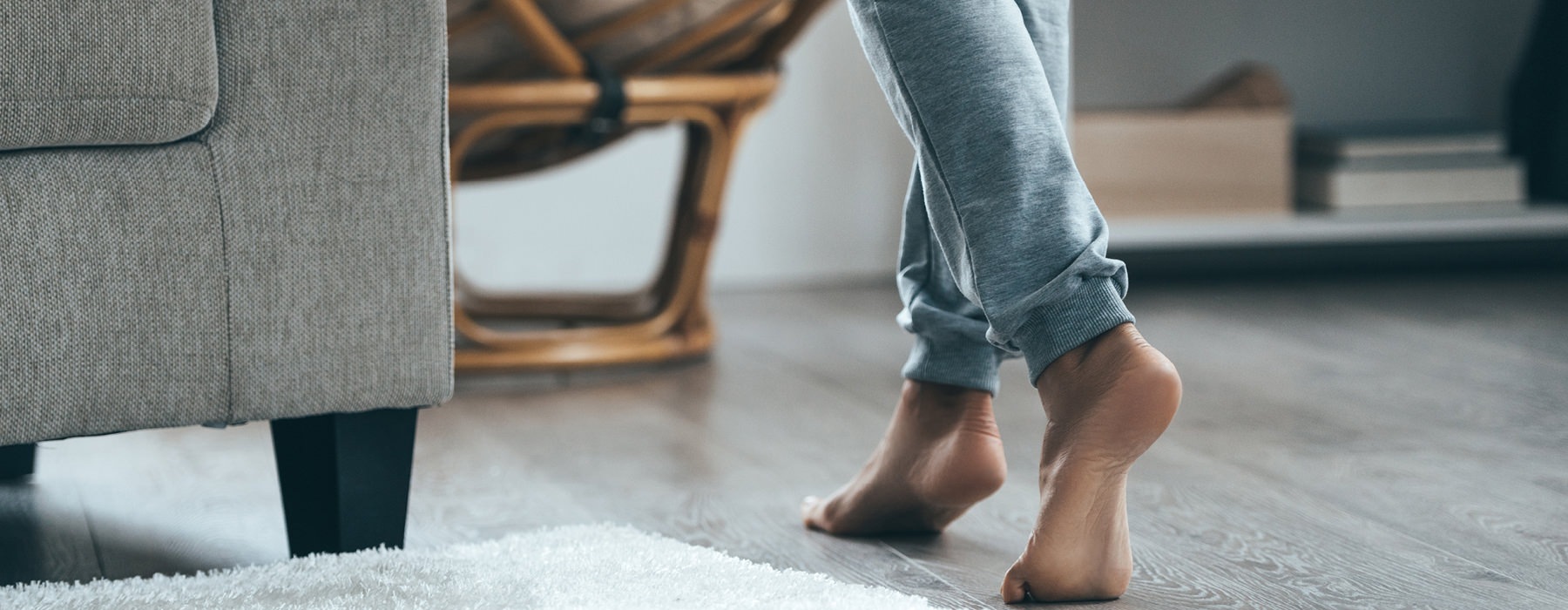 Woman walking in her living room 